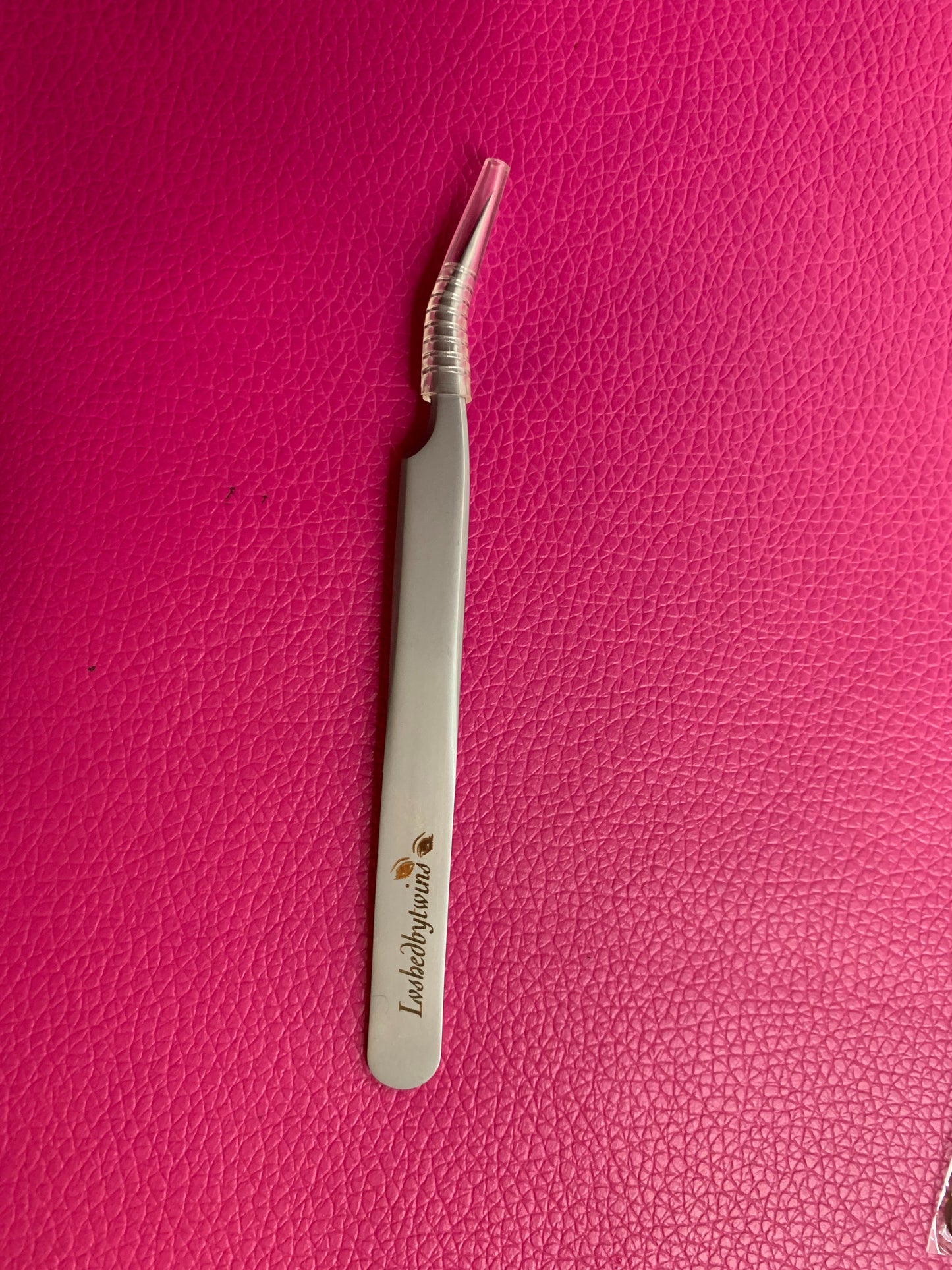 Curved tweezers